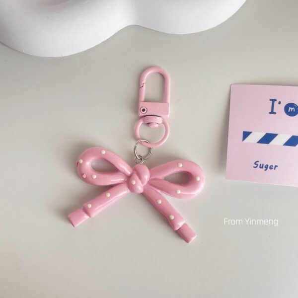 Wholesale spring and summer candy-colored hollow butterfly bow keychain