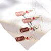 O1CN01psxIM62AdZ98jETkC_2207964798226-0-cib Wholesale Romantic Letters Xoxo Pink Valentine's Day Oil Drop Pendant Earrings