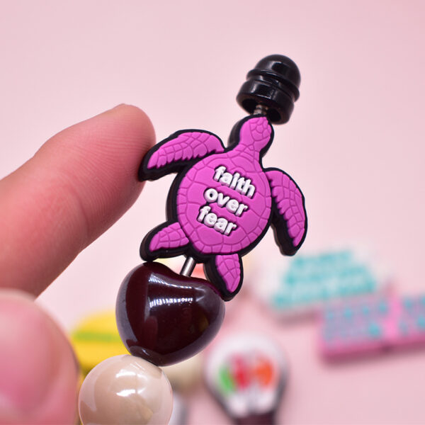 O1CN01qgvu2f1t0m8B9etgT_2207248195840-0-cib Wholesale Random phrase cartoon cross Focal Beads