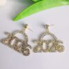O1CN01qkz5LE1bORU8xokS7_2217245643455-0-cib Wholesale Diamond Number Arched Geometric Earrings