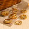 O1CN01rEzOmg2AUrXCu6tMF_2213308878207-0-cib Wholesale Gold-colored bread-shaped heart-hammering pattern seal ring