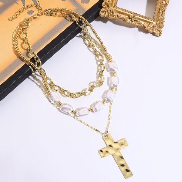 O1CN01rR0kLg1VD60QSKf7D_2466522618-0-cib Wholesale Punk-style pearl and metal cross necklace