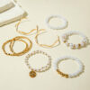 Wholesale Multi-layered Pearl Bracelet and Gold Bangle.