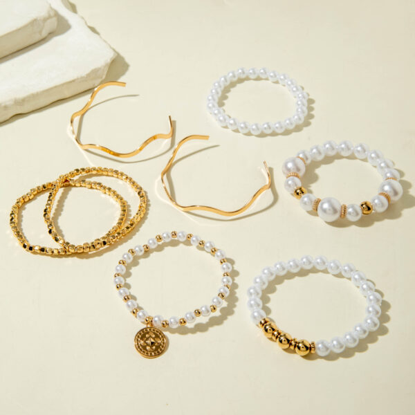 Wholesale Multi-layered Pearl Bracelet and Gold Bangle.