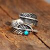 O1CN01rryMdF1qyMN8TjNBv_2206372095564-0-cib Wholesale Feather inlaid turquoise open silver ring