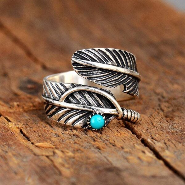 O1CN01rryMdF1qyMN8TjNBv_2206372095564-0-cib Wholesale Feather inlaid turquoise open silver ring
