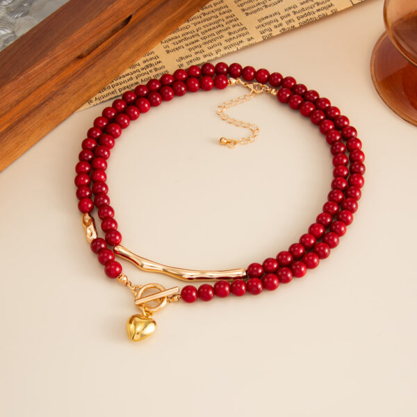 O1CN01rvZkYc23kFcBs0FEJ_2588757293-0-cib Wholesale Red acrylic OT buckle heart-shaped pendant necklace