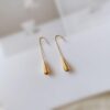 Wholesale Stainless steel stud earrings with gold-plated teardrop round beads
