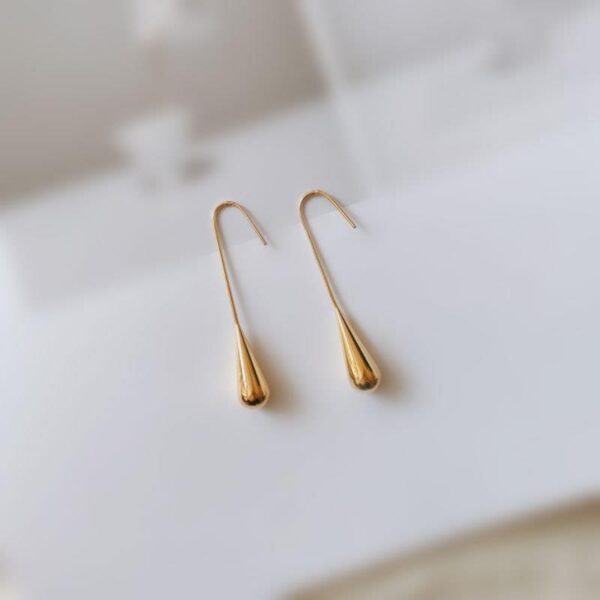 Wholesale Stainless steel stud earrings with gold-plated teardrop round beads