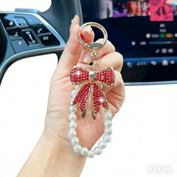 O1CN01sA0VrX1PCHcJPJbFQ_2218535611804-0-cib Wholesale Diamond studded bow chain pearl bead keychain