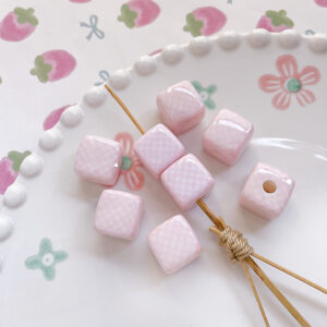 2 # Pink and white polka dot style (one piece)