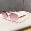 Wholesale Retro oval frameless sunshade sunglasses