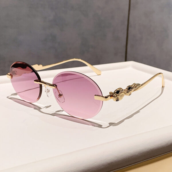 Wholesale Retro oval frameless sunshade sunglasses