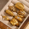 O1CN01sOOyY42AUrXDiM4hx_2213308878207-0-cib Wholesale Gold-colored bread-shaped heart-hammering pattern seal ring