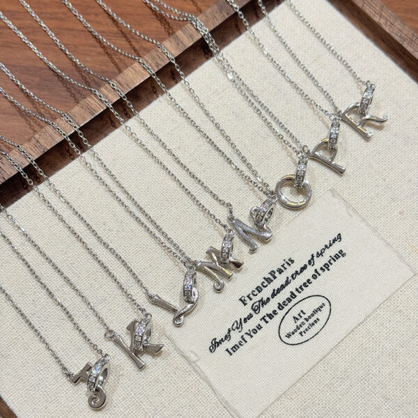 Wholesale 26 letter titanium steel necklace with diamonds