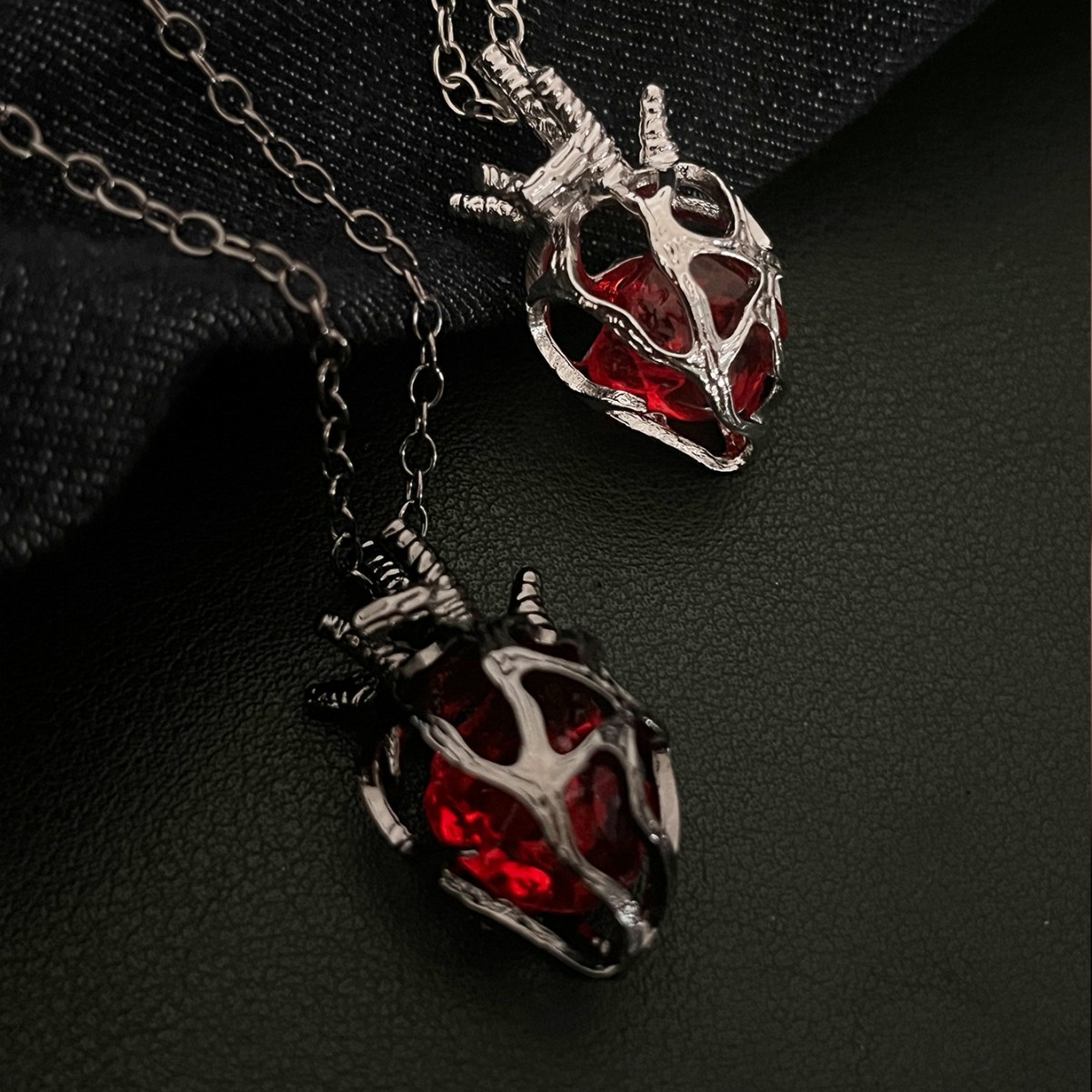 Wholesale Gothic dark style hollow heart red blue glass heart pendant necklace