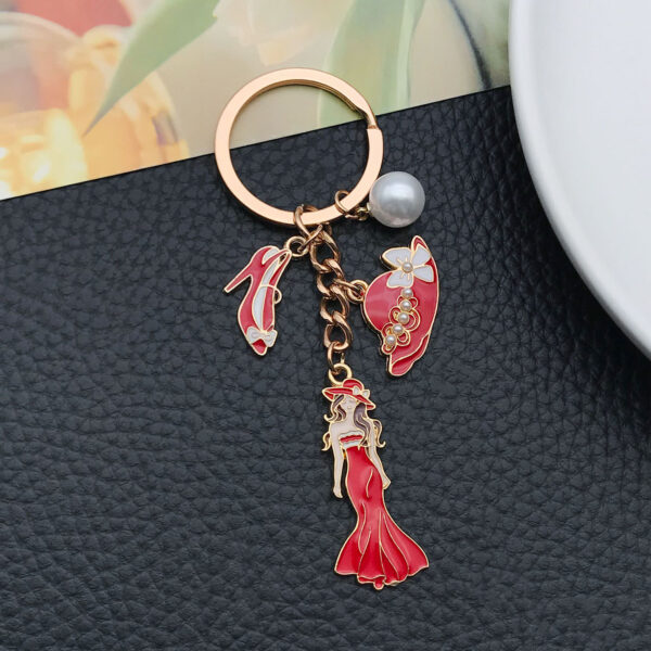 Wholesale Cross-border oil drop red alloy princess dress model hat high heels pearl keychain niche jewelry pendant