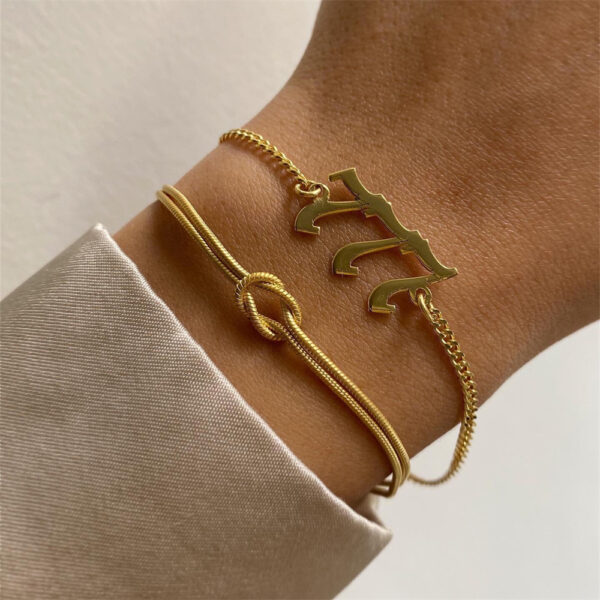 Wholesale Valentine's Day gift stainless steel knot snake chain bracelet hand knotted clavicle chain herringbone necklace ring gold plated