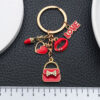O1CN01uVnKGM2KpbcdLmbRp_2217654629606-0-cib Wholesale Red LOVE Red Lips Love Bag Keychain