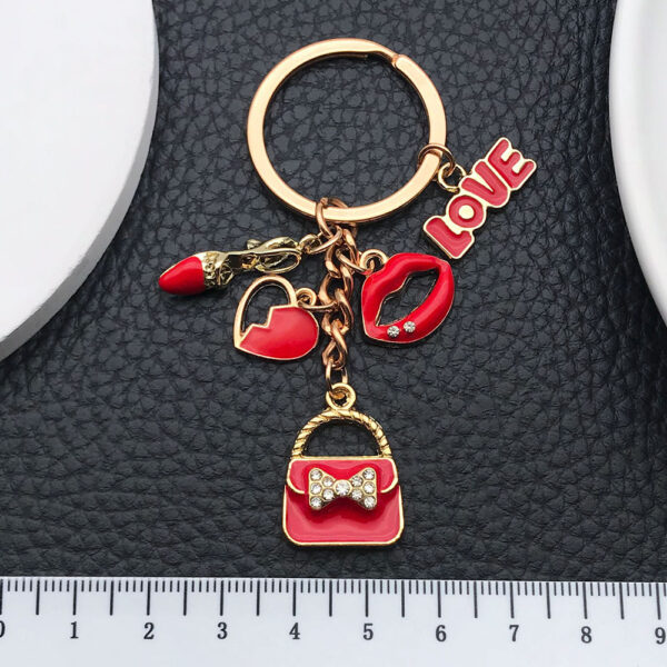 O1CN01uVnKGM2KpbcdLmbRp_2217654629606-0-cib Wholesale Red LOVE Red Lips Love Bag Keychain