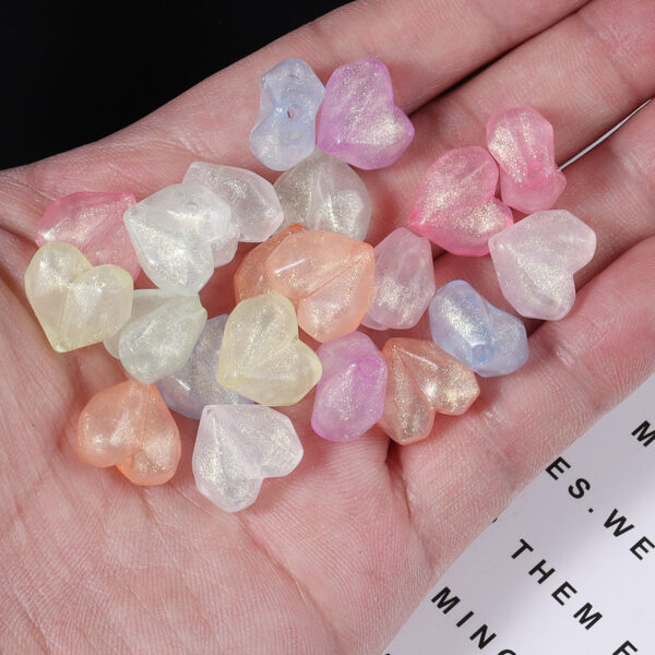 O1CN01uYO6742NBFbakgvcP_2206452709924-0-cib Wholesale 50pcs luminous colored cut three-dimensional heart-shaped acrylic beads