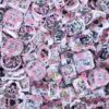O1CN01v6yHuR1l5L9Lq248y_2221007554767-0-cib Wholesale style double-sided embossed printed beaded bag charms and aessories.