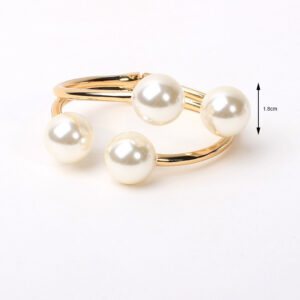 Four large golden pearls