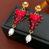 Wholesale Half transparent red tassel heart-shaped earrings