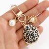 Wholesale Marine life pearl leopard shell keychain