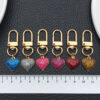 O1CN01wSx8iF2KpbcZqJUqI_2217654629606-0-cib Wholesale 6-Color ip Oil Love Valentine's Day U-shaped Keychain Set