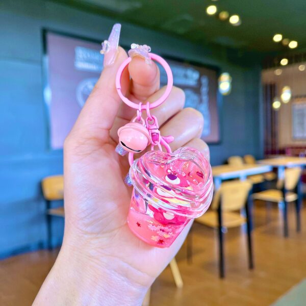 Wholesale Oil filled pink strawberry bear quicksand keychain