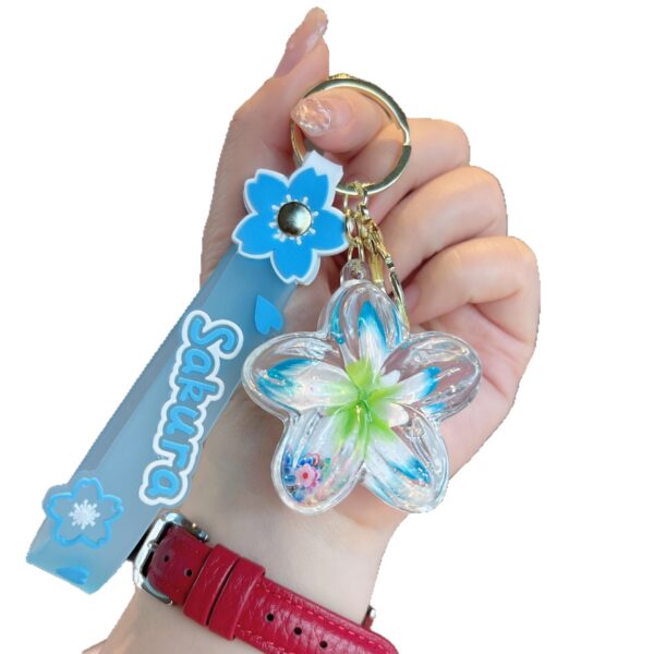 O1CN01wpFqeV1k48STIbTip_2211846614629-0-cib Wholesale Acrylic Liquid Sand Plumeria Keychain