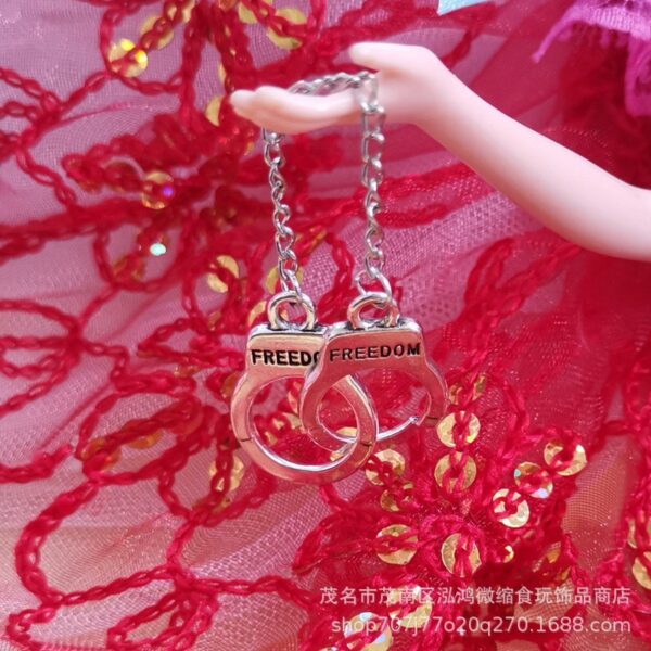 Wholesale mini simulation prisoner handcuffs toy doll accessories