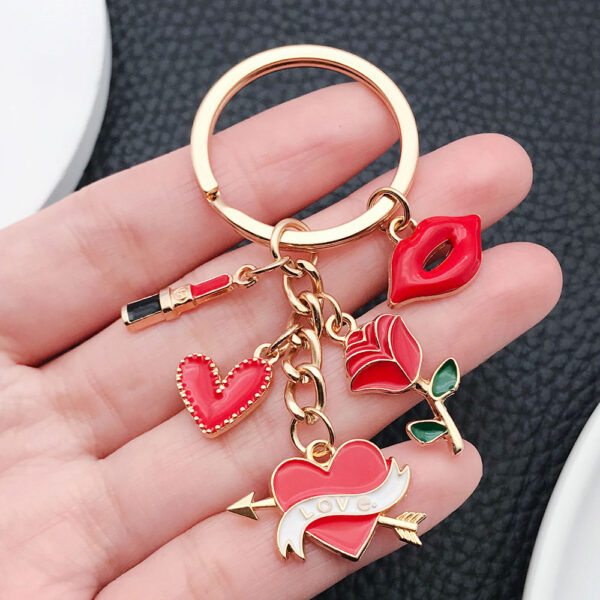 O1CN01xbAuBn2KpbcadSX3X_2217654629606-0-cib Wholesale Red Cartoon Lipstick Bag Love Rose Keychain