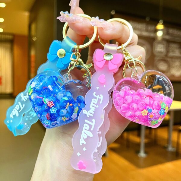 Wholesale Creative Summer Colorful Sand Heart Glow-in-the-Dark Keychain