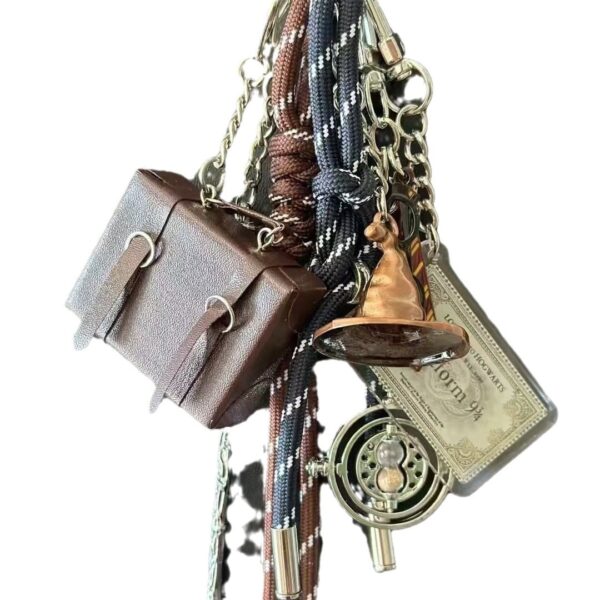O1CN01yDBS4S27fuESbnQ1I_2214234377825-0-cib Wholesale Magic Wizard Hat Magic Wand Series Alloy Keychain