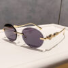 Wholesale Retro oval frameless sunshade sunglasses