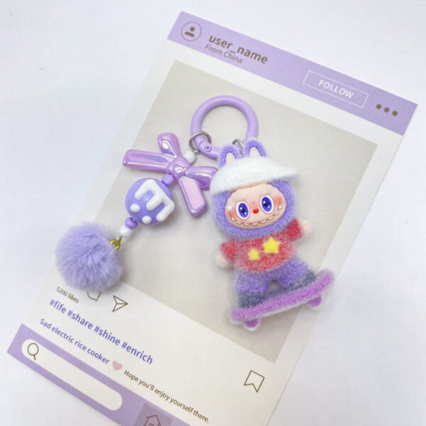 O1CN01yQy9ZZ1qBMQW0fpvJ_2219486535457-0-cib Wholesale Flocked Skateboard Cute Doll Keychain OLY Exclusive