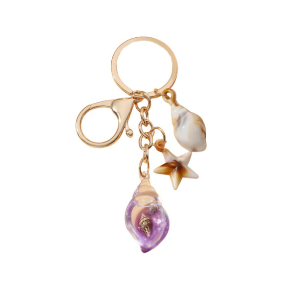 Wholesale Seaside vacation luminous conch metal keychain
