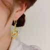 Wholesale Retro geometric hollow double heart tassel earrings
