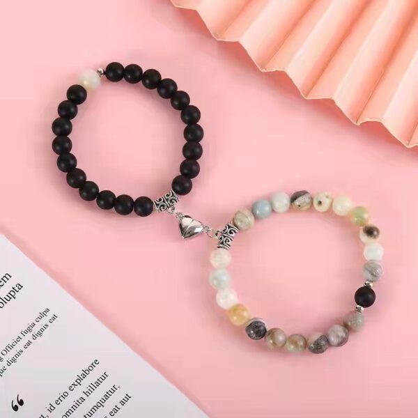 Wholesale Couple bracelet with crystal elastic cord, geometric magnetic clasp, and beaded design.