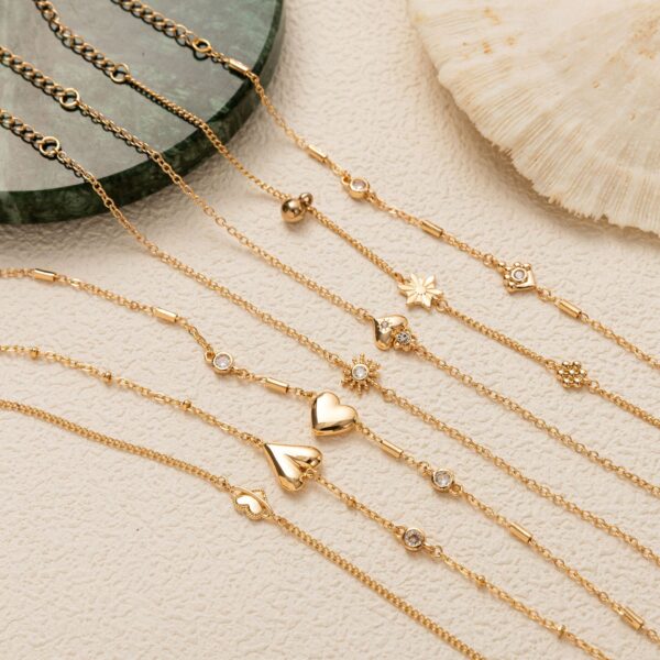 O1CN01z39f4c1X9Y7METHn0_2210559832881-0-cib Wholesale jewelry light luxury style love plating zircon gold plated adjustable bracelet batch