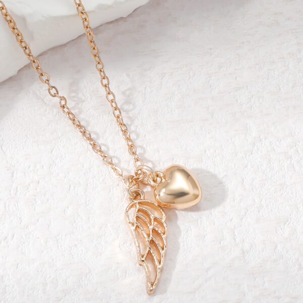 Wholesale Double-flying Tanabata Couple Hollow Wings Love Pendant Necklace