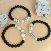 O1CN01zreVT62IVKioDVcOD_3919529291-0-cib Wholesale Halloween White Turquoise Skull Ghost Head Volcanic Stone Luminous Bracelet