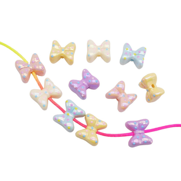 O1CN01zuRdwP1aedudxeea6_2219135483355-0-cib Wholesale Acrylic Plated Cartoon Bow Loose Acrylic Beads