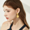 Wholesale Golden circular geometric texture earrings