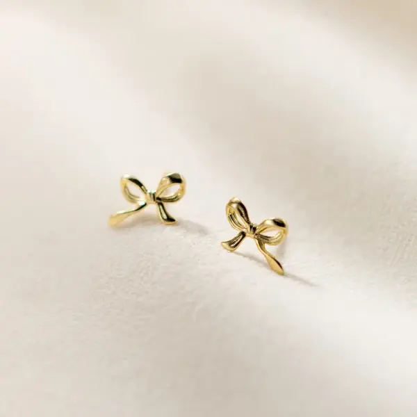 Wholesale 1 Pair Simple Style Bow Knot Plating Copper Ear Studs