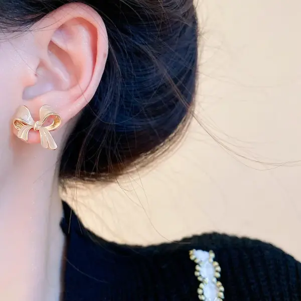 Wholesale Fashion Butterfly Bow Knot Copper Inlaid Zircon Artificial Pearls Earrings 1 Pair