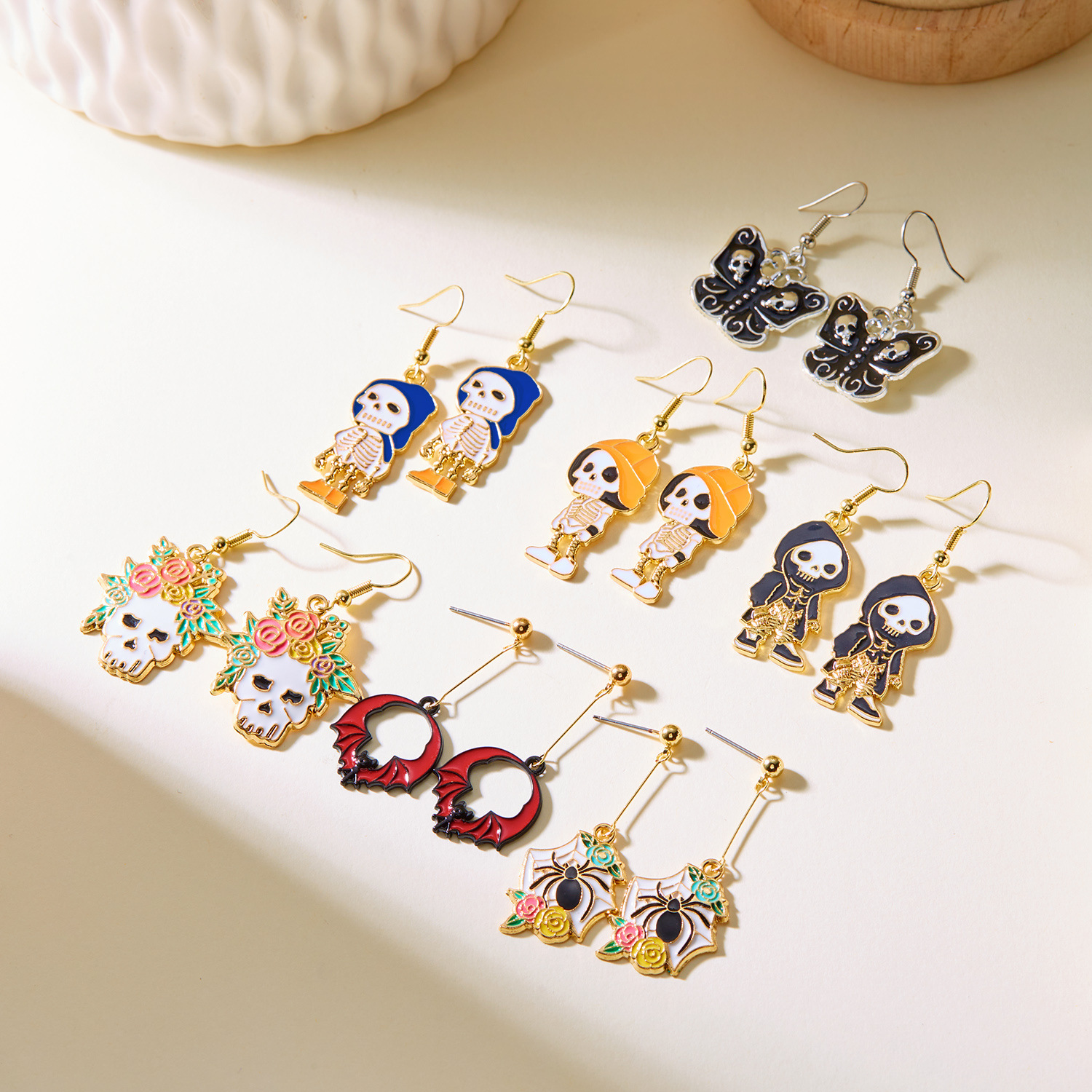 Wholesale Europe and the United States cross-border new earrings fashion creative painting oil flowers skull ear hook earrings