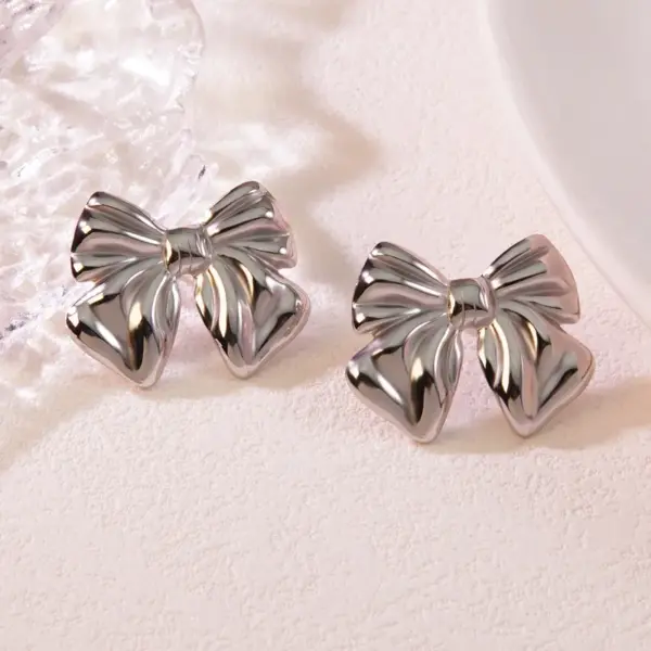 oly-00c92ed9e1a68920496c562ada1df7ee Wholesale 1 Pair Casual Simple Style Classic Style Bow Knot 304 Stainless Steel Imitation Gold Electroplating Ear Studs